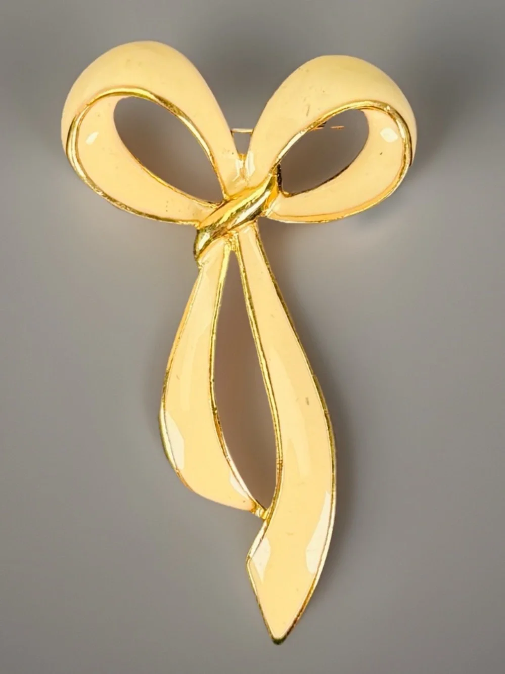 Goldtone Bow Cream Colored Brooch